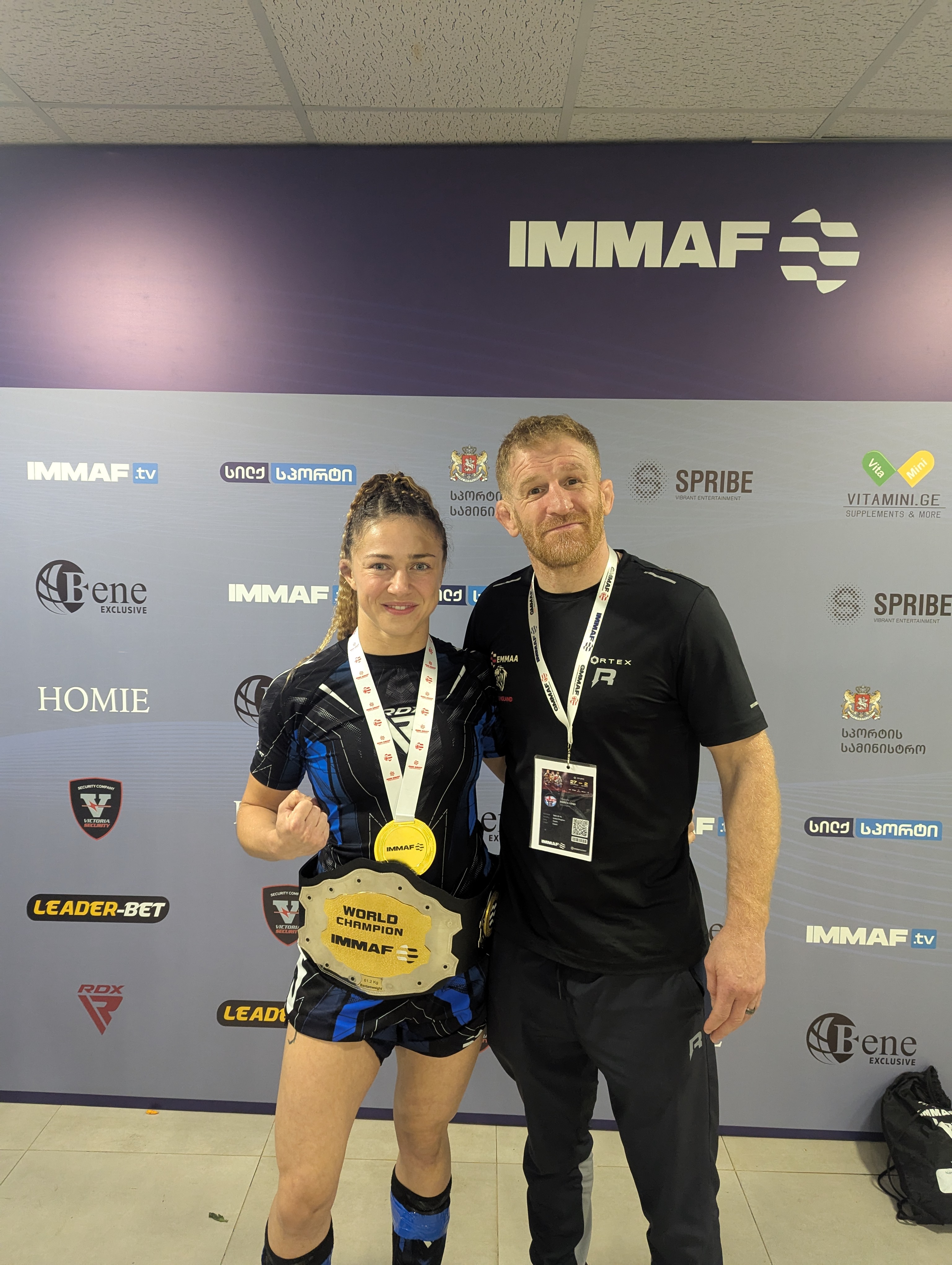 Andrew Fisher with Katrina Fisher after her IMMAF World Championship victory